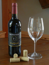 photo of red wine in bottle