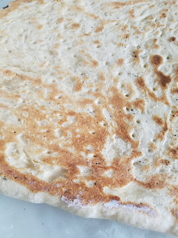 bottom of pizza crust