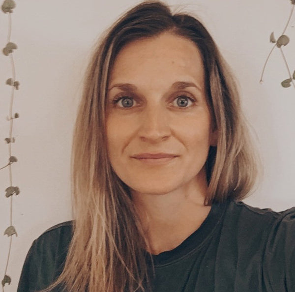 How Ayurveda is useful in modern life. A profile image of Jemima Kerr, Ayurvedic practitioner, looking at the camera with a half-smile.  