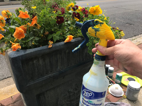 Dyeing cement planters with paint, water sprayer
