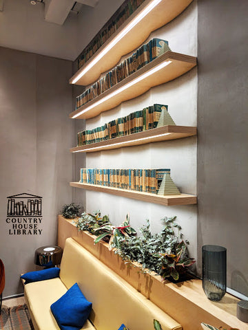 country-house-library-shelfie-we-works-london-pelican-books-design