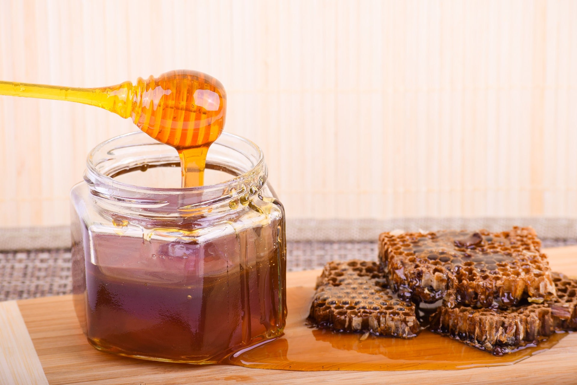 Jar of honey and honeycomb.