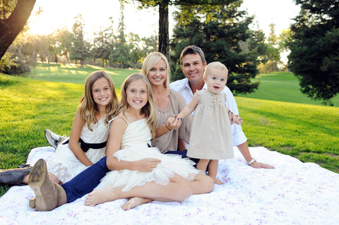 Claire and Ronnie Ekelund, founders of Bebe au Lait, with family