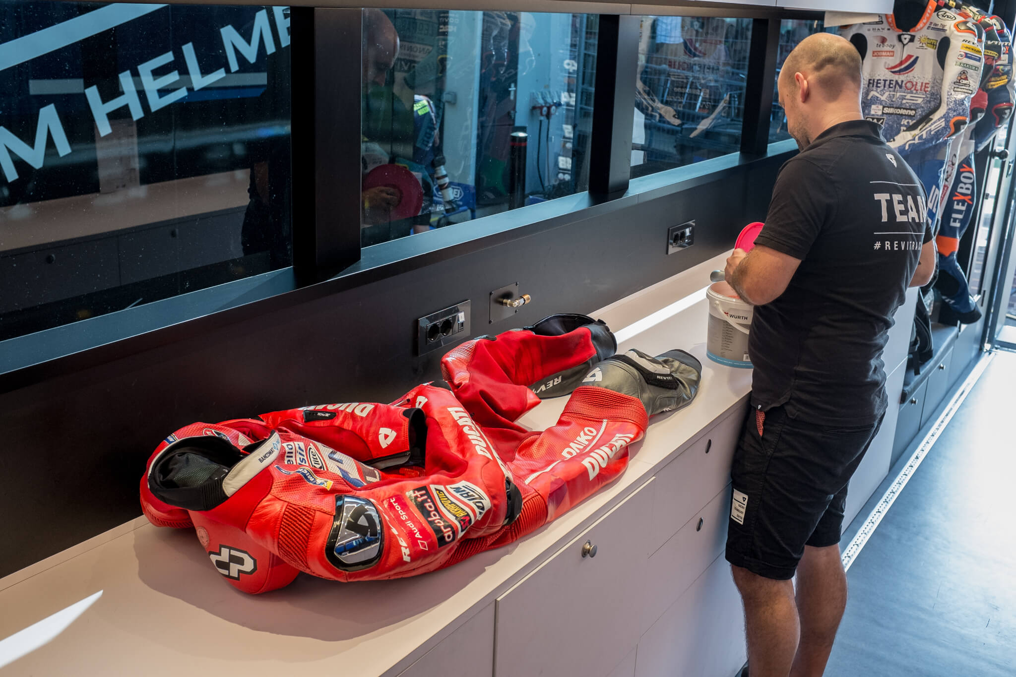 REV'IT! service manager Michiel is taking care of Danilo Petrucci's suit after the race