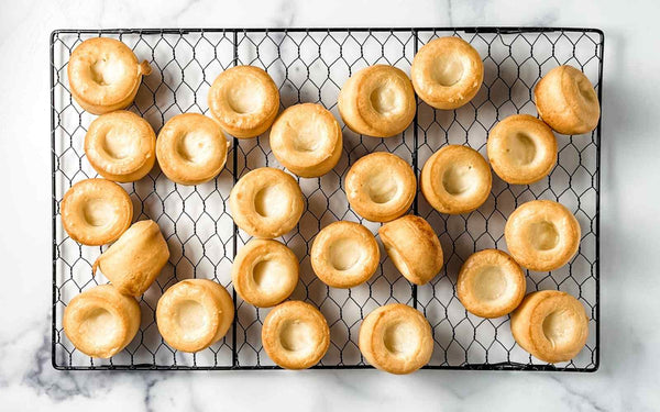 truffle pao de queijo on a wire rack 