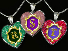 Letters R S T are shown against black background from the Alphabet Monogram Heart Pendant Range