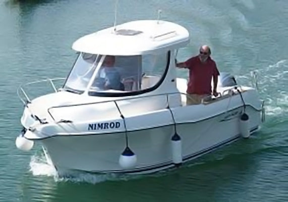 fenders hanging off boat