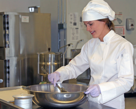 Christine from Hope Bars in the kitchen making our quinoa bars