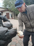 Feeding the bear statue ice cream in McCall Idaho
