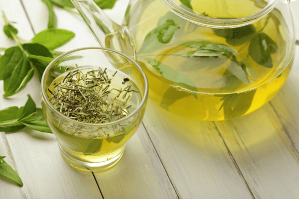 green tea with tea leaves