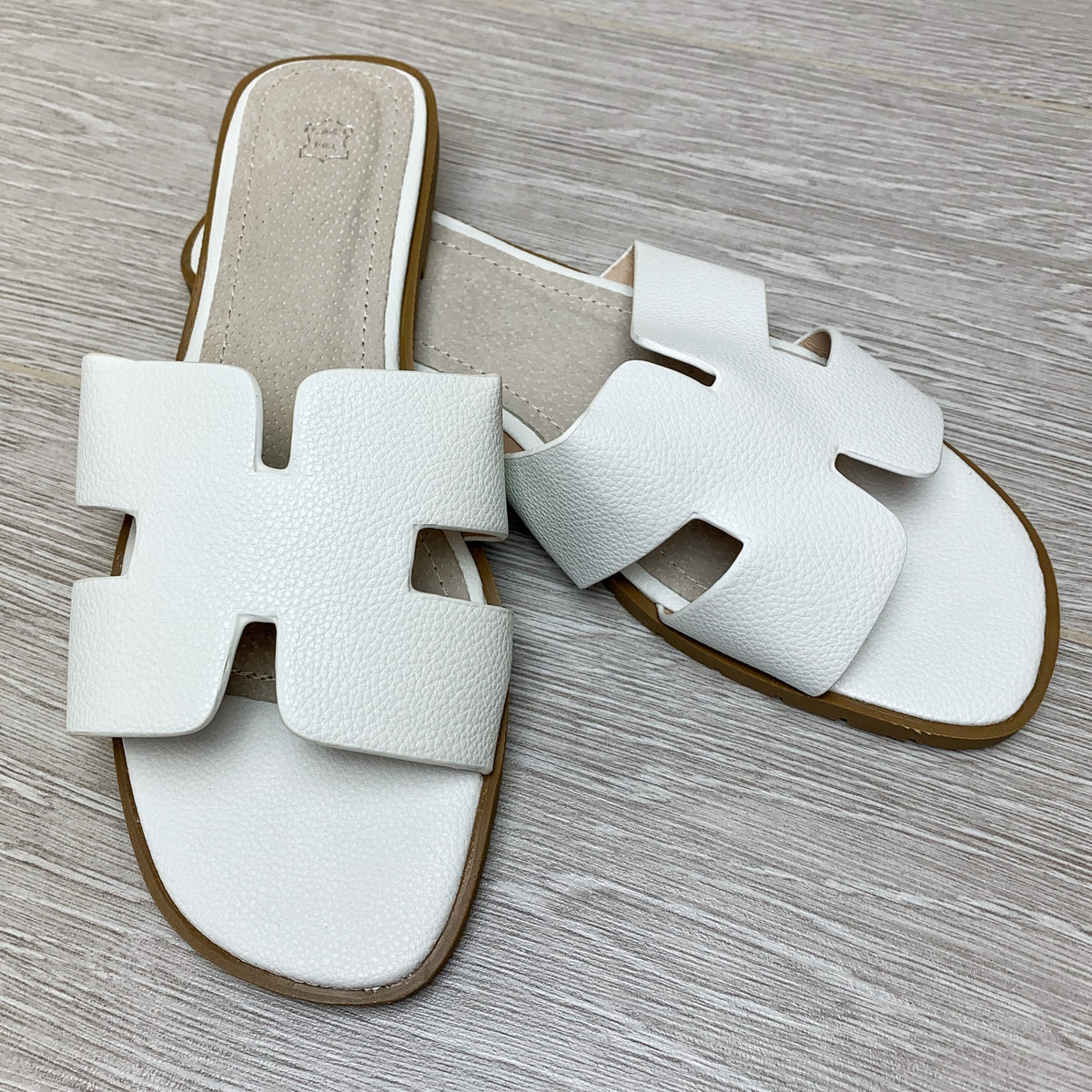 white hermes style sandals