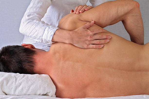 Sports massage for a male patient 