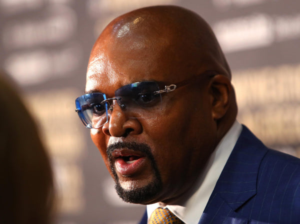 Leonard Ellerbe wearing Cartier wood glasses