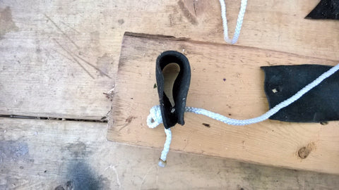 Pull the leather tab to the knot to test it out.