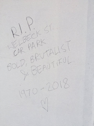 An epitaph to the doomed building on hoardings at Welbeck Street Car Park in London