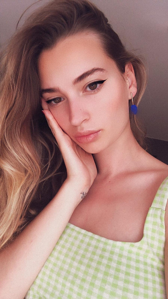 Sara Ajazi wearing Isla Fontaine Klein earrings