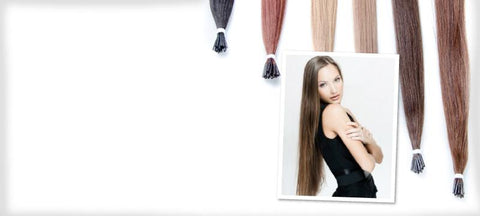 brunette model with long hair and strands of different colored microbead extensions