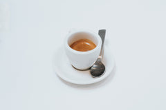 Espresso in white cup with spoon
