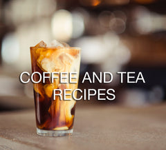 iced coffee with cream on wooden table