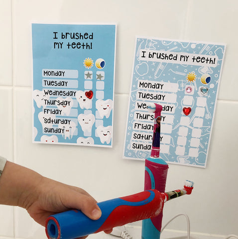 Kids using the toohbrushing sticker chart
