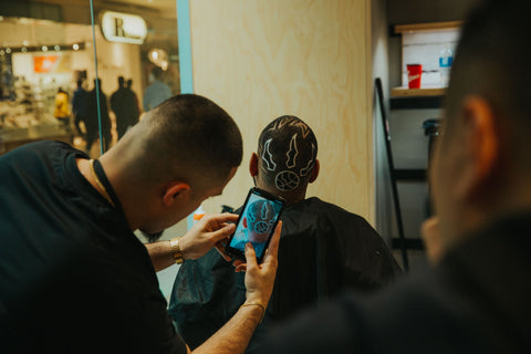 Footaction barber battle hosted by Reebok, Toronto Raptors haircut done by Claudio the barber from Fade Room barbershop
