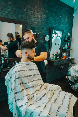 Jon Bakero gets his haircut at Fade Room by Nelson Pires