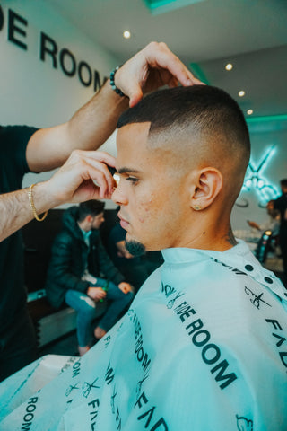Toronto Fc soccer player Auro JR gets his haircut at Fade Room by Claudio Ferreira