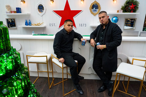 Claudio Ferreira and Emmanuel Andrei Climaco at the Fade Room Heineken barbershop event at Toronto's Eaton Centre