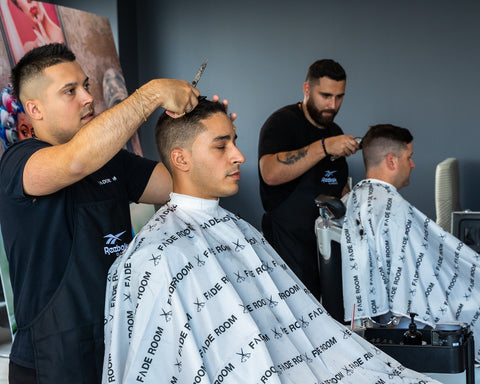 Claudio Ferreira and Joshua Dos Santos cut hair at Reebok. Fades from Fade Room barbershop