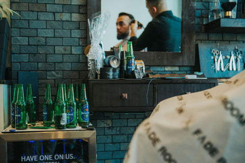 Heineken fridge inside of Fade Room's barbershop