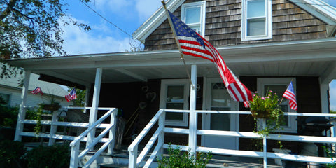 house with american flags