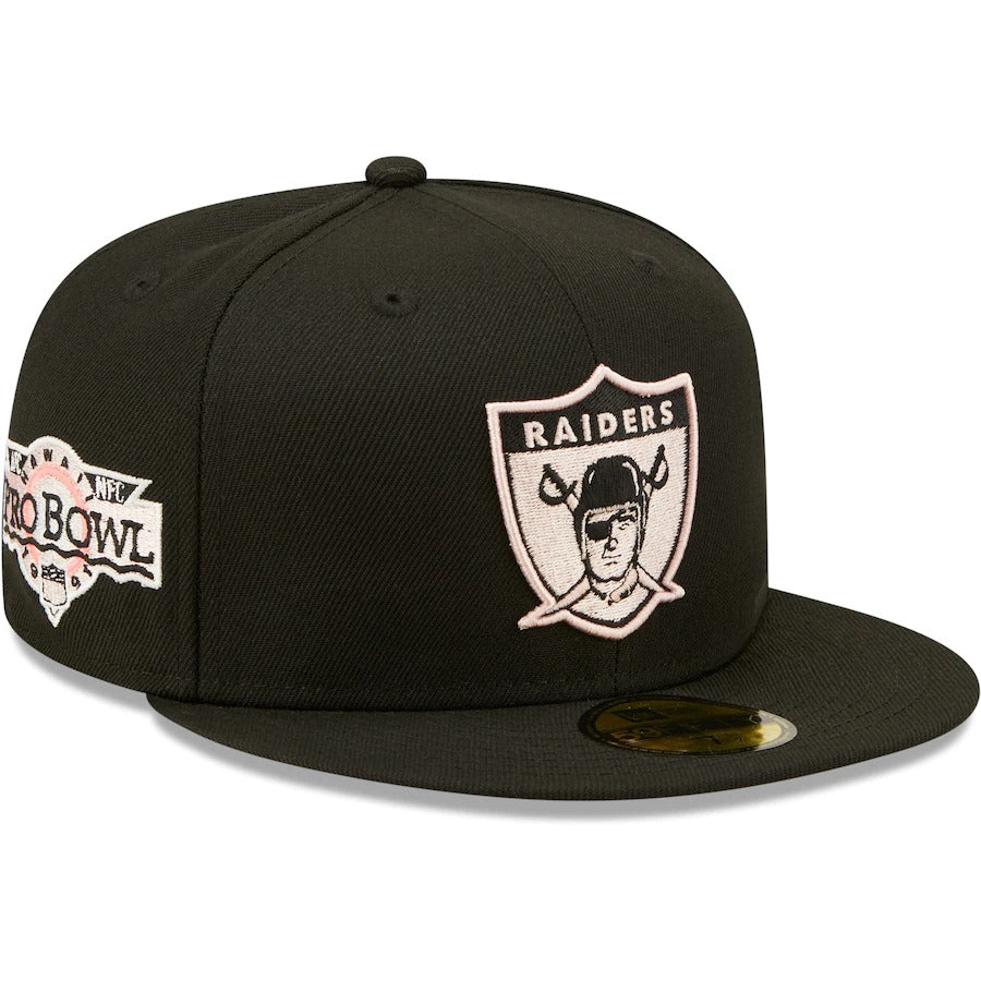 black and pink raiders hat