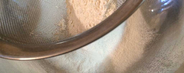 Sift flour for biscuit bites