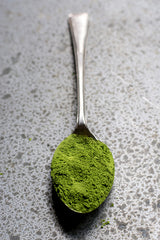 A spoonful of powdered green matcha