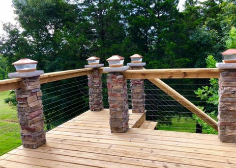 Rock post stainless steel cable railing with wood top rail