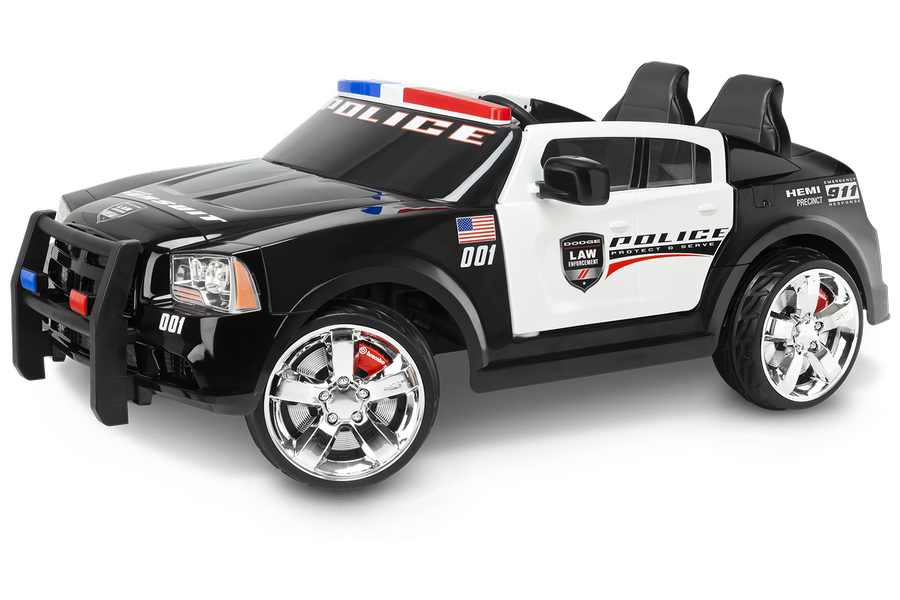 kids riding police car