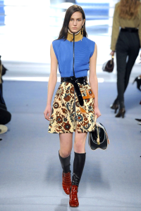 runway model wearing a printed A-line skirt