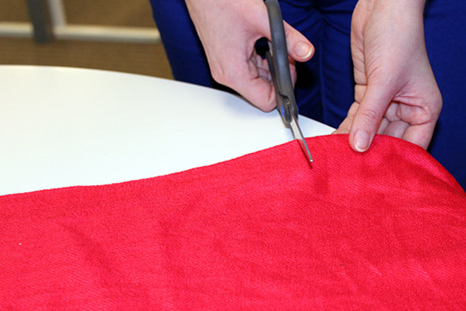 cutting up the scarves into squares for the Ombre Scarf Chandelier