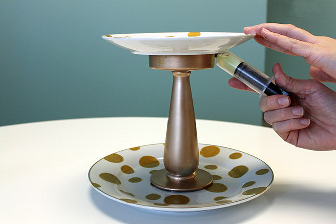 application of the silicone adhesive sealant on the candlestick