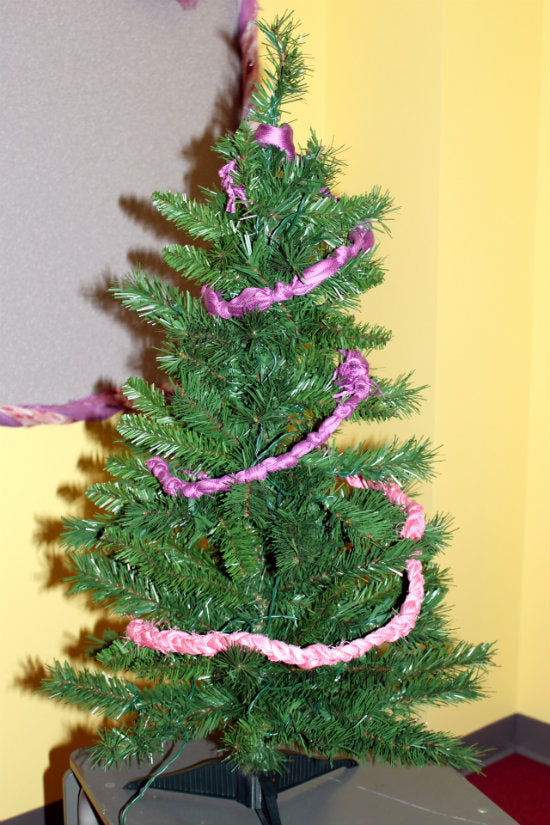 humble tree wrapped in scarf garland