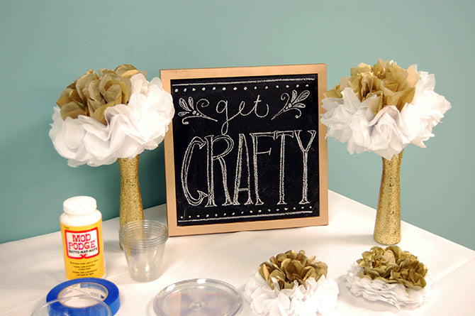 DIY gold glitter sparkling vases on display