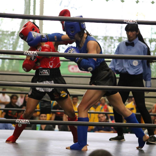 Coral Carnicella fighting Mexico at the 2019 South American Championship