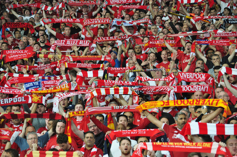 Soccer Fans Hold Up Scarves - Soccer's Defining Apparel Piece