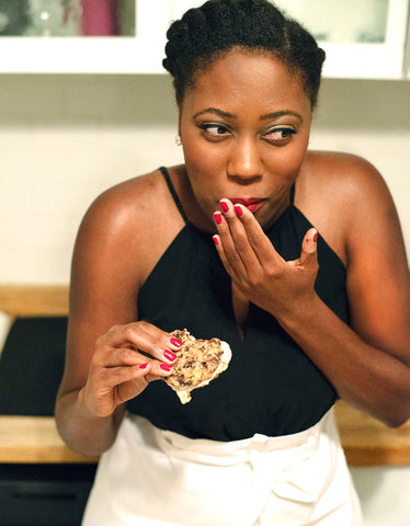 Danielle Tubbs eating a vegan cookie