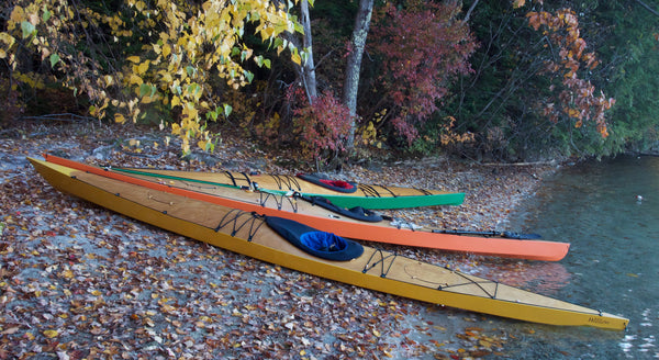 wooden sea kayaks on squam lake