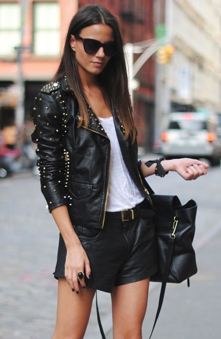 Young woman in a leather jacket