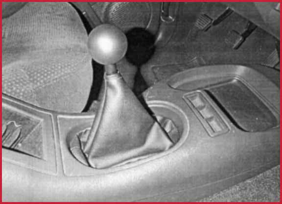 Six-speed shifter comes through the cup-holes of 1995 Blazer console, Stealth Conversions