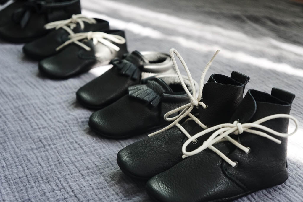 Amy and Ivor black baby moccasins by Charisse Goings growing up goings blog