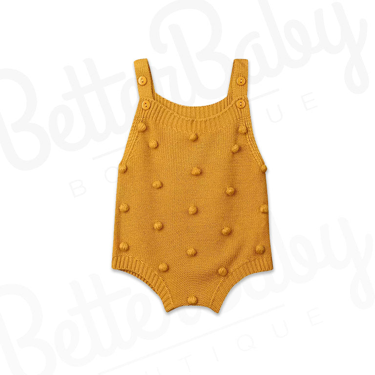yellow knitted baby outfit