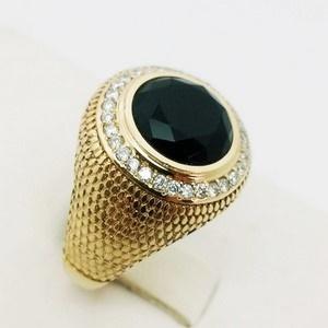 gold and diamond ring with black onyx stone